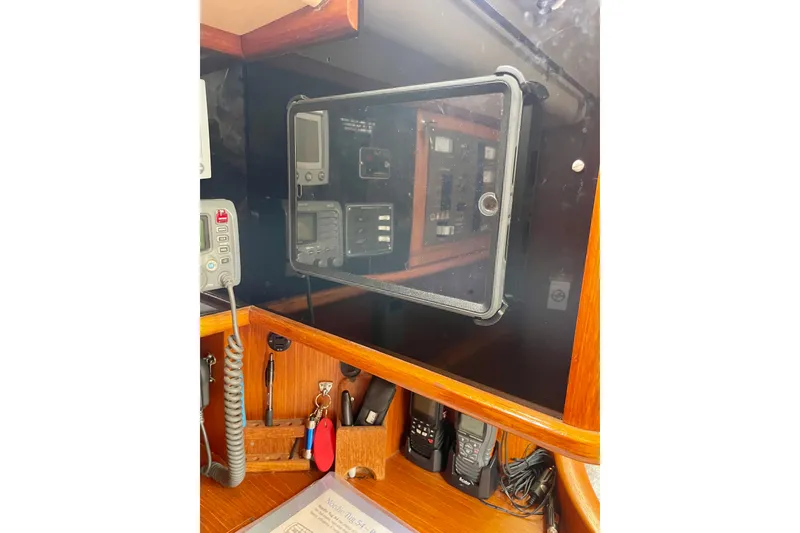 Slide: The Image of Control panel and communication devices on a 2000 Moody 42 CC yacht. - 42