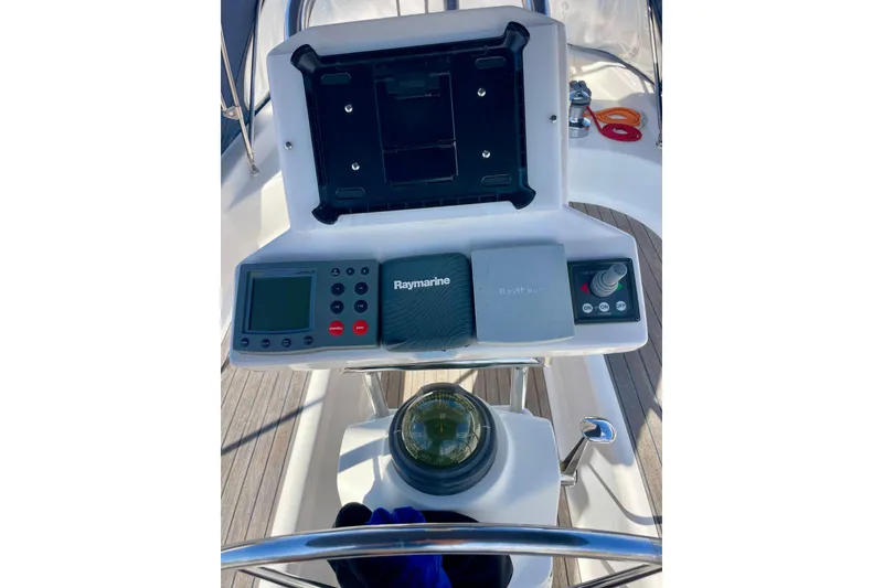 Slide: The Image of Steering console of 2000 Moody 42 CC yacht with Raymarine navigation equipment. - 5