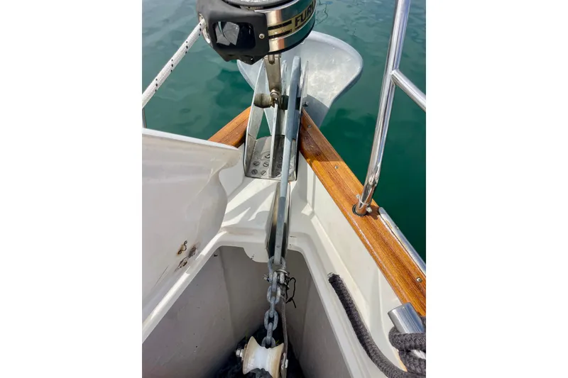 Slide: The Image of Anchor system on a 2000 Moody 42 CC sailboat, featuring chain and windlass. - 60