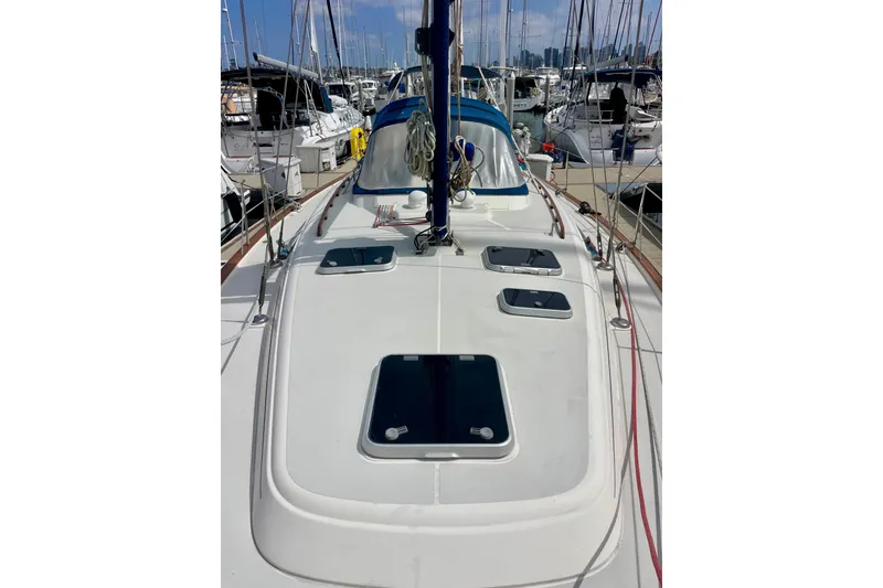Slide: The Image of Sailboat deck view of 2000 Moody 42 CC, docked in a marina. - 62