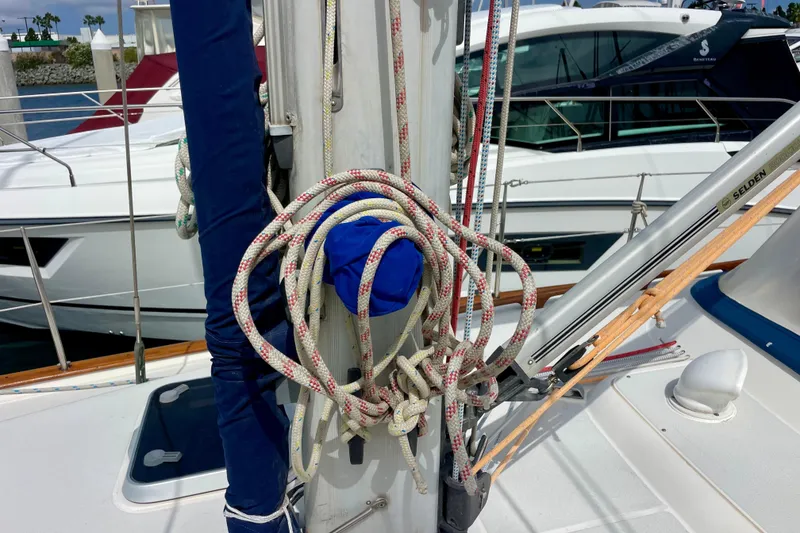 Slide: The Image of Sailboat deck with ropes and mast, Moody 42 CC, 2000 model, docked at marina. - 67