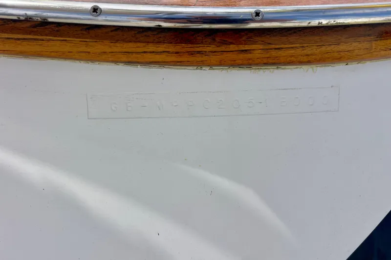 Slide: The Image of Hull identification number on Moody 42 CC sailboat, 2000 model, with wood and metal trim. - 76