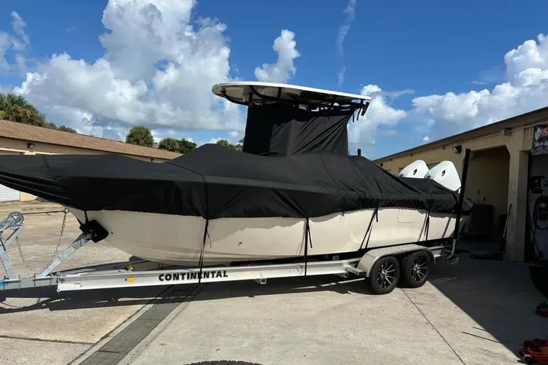 Slide: The Image of 2024 Sea Chaser 24 HFC boat with dual outboard motors and stainless steel propellers. - 10