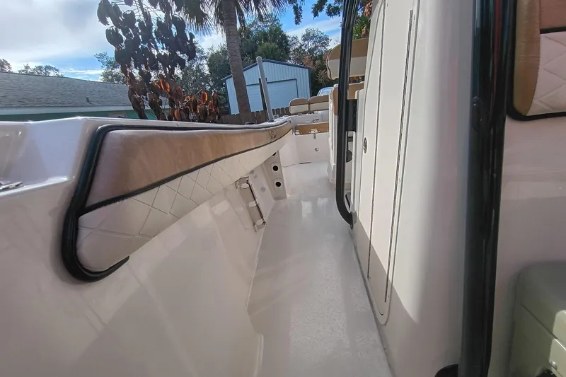 Slide: The Image of 2024 Sea Chaser 24 HFC boat interior with sleek design and comfortable seating. - 28