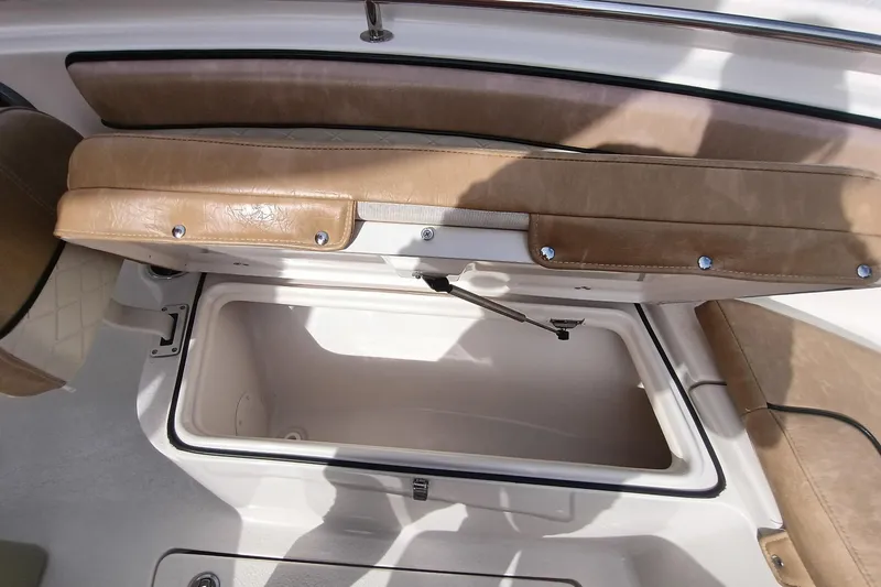 Slide: The Image of 2024 Sea Chaser 24 HFC boat seat with storage compartment open. - 42