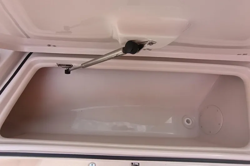 Slide: The Image of Open storage compartment in 2024 Sea Chaser 24 HFC boat, showcasing interior space. - 45