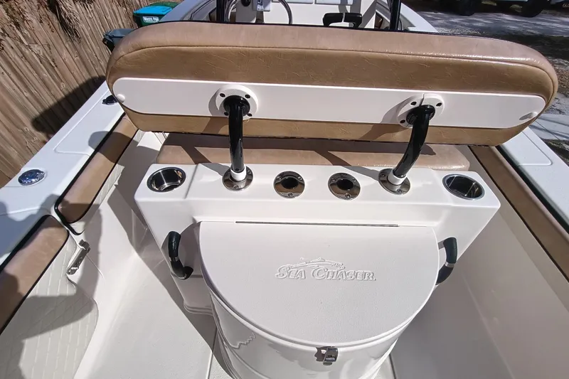 Slide: The Image of 2024 Sea Chaser 24 HFC boat interior with seating and storage features. - 52