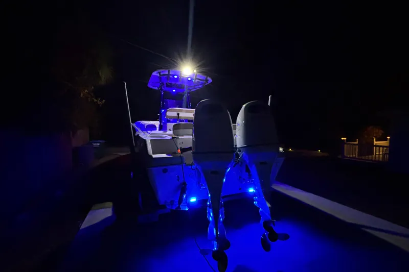 Slide: The Image of 2024 Sea Chaser 24 HFC boat console with steering wheel and controls. - 69