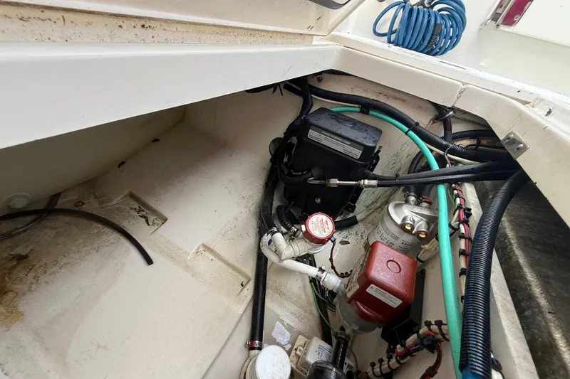 Slide: The Image of Storage compartment on a 2011 Boston Whaler 285 Conquest boat. - 14