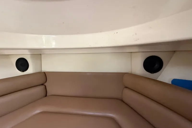 Slide: The Image of Interior of 2011 Boston Whaler 285 Conquest with kitchenette, microwave, and sink. - 27