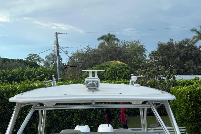 Slide: The Image of Twin Mercury Verado 300 engines on a 2011 Boston Whaler 285 Conquest boat. - 43