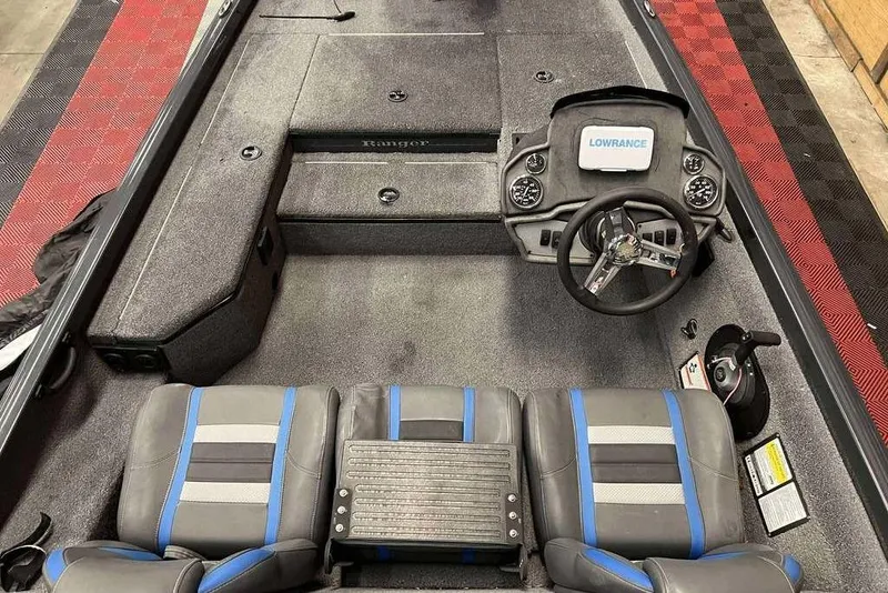 Slide: The Image of 2022 Ranger RT178 boat interior with steering console and seating. - 6