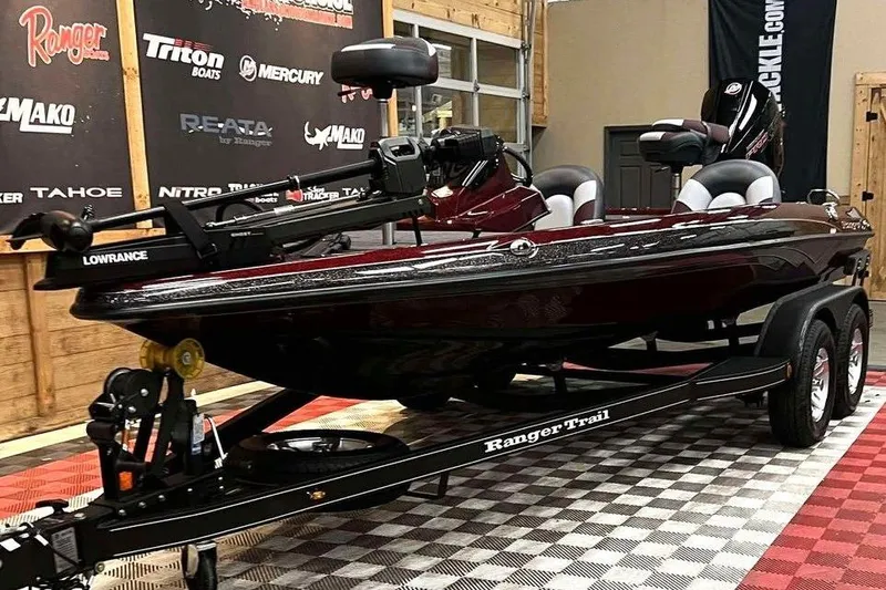 Slide: The Image of 2026 Ranger Z185 boat on display with Lowrance equipment and Ranger Trail trailer. - 6