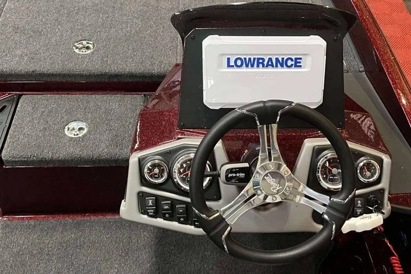Slide: The Image of 2026 Ranger Z185 boat dashboard with Lowrance electronics and steering wheel. - 7