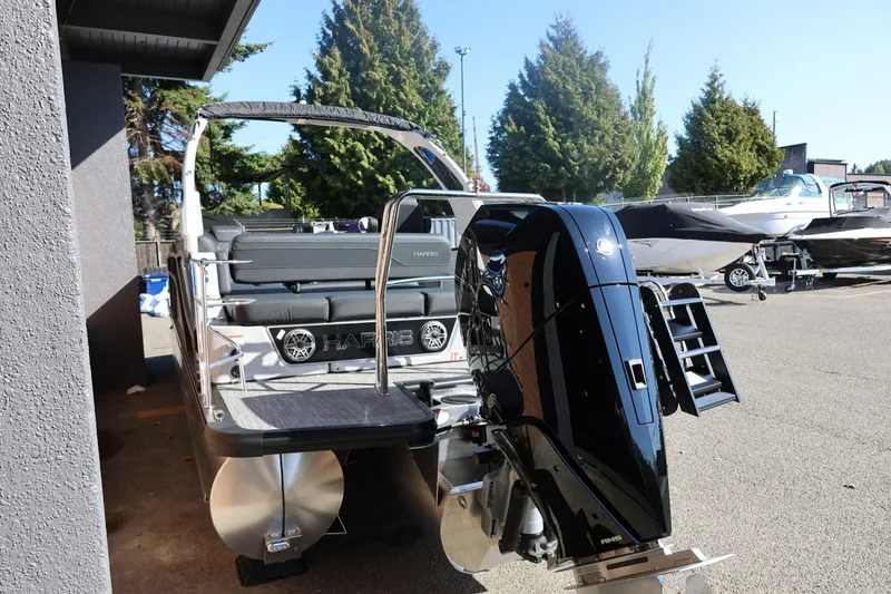 Slide: The Image of Interior of 2026 Harris Grand Mariner 250 boat with seating and storage compartments. - 16