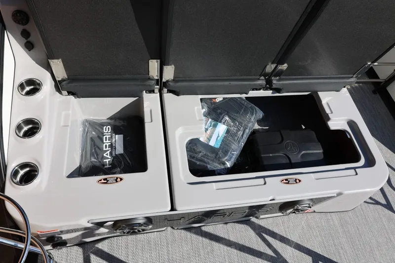 Slide: The Image of Luxurious seating on 2026 Harris Grand Mariner 250 boat with premium upholstery and cup holders. - 18