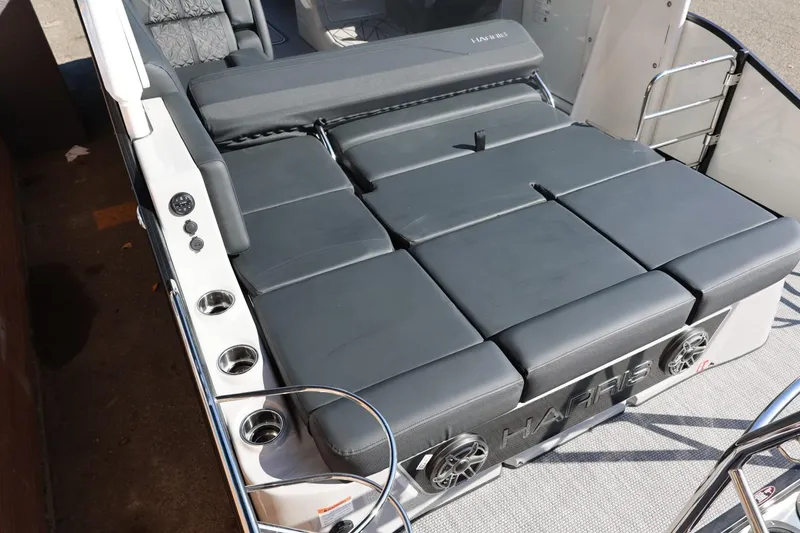 Slide: The Image of 2026 Harris Grand Mariner 250 boat helm with modern controls and comfortable seating. - 20