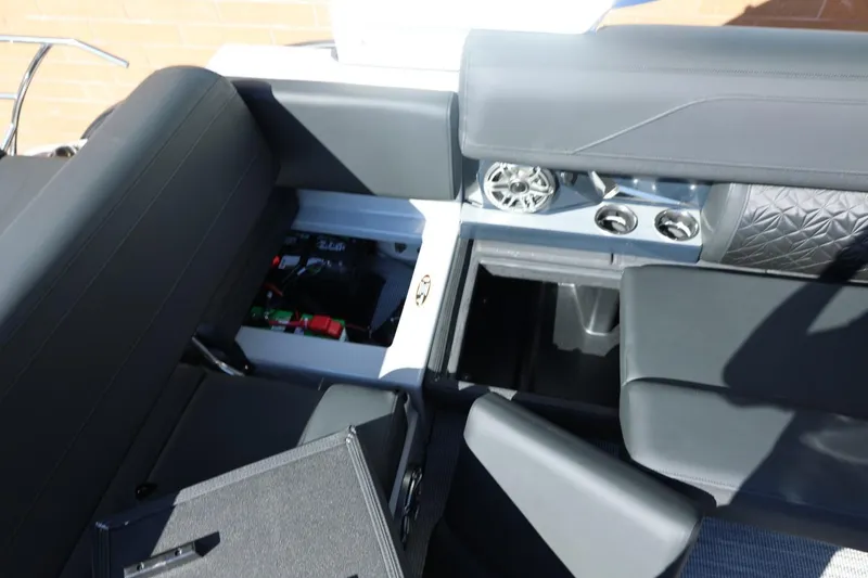 Slide: The Image of 2026 Harris Grand Mariner 250 dashboard with steering wheel and control panel. - 23