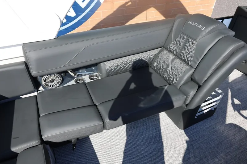 Slide: The Image of 2026 Harris Grand Mariner 250 boat interior with modern steering and dashboard controls. - 25