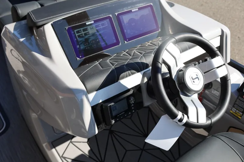 Slide: The Image of 2026 Harris Grand Mariner 250 interior with luxurious seating and modern design. - 33