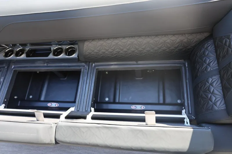 Slide: The Image of Mercury outboard motor on 2026 Harris Grand Mariner 250 boat, close-up view. - 45