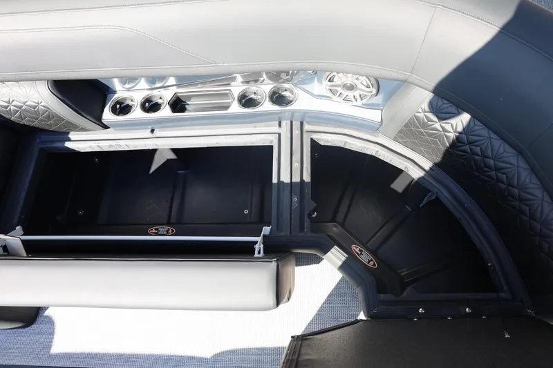 Slide: The Image of 2026 Harris Grand Mariner 250 pontoon boat interior with modern seating and helm. - 47