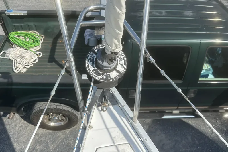 Slide: The Image of View from a 1985 Hunter 28.5 sailboat mast, with truck and ropes visible below. - 5