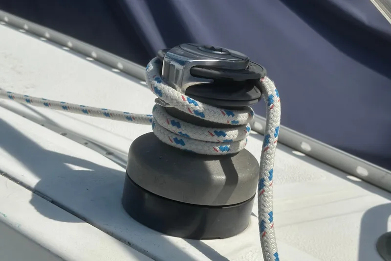 Slide: The Image of Winch with rope on 1985 Hunter 28.5 sailboat deck. - 8