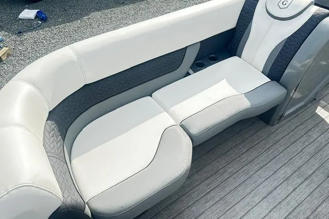 Slide: The Image of Luxurious seating on 2021 Godfrey Monaco 235RL Tri Toon boat, featuring elegant design and comfort. - 10