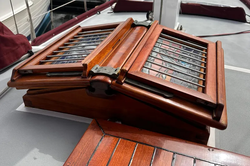 Slide: The Image of Wooden hatch detail on 1978 Tayana Mariner sailboat deck. - 3