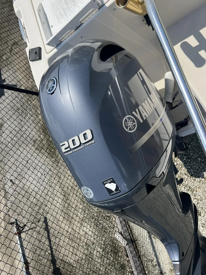 Slide: The Image of Yamaha 200 HP outboard motor on World Cat 266SC boat, year 2002. - 11
