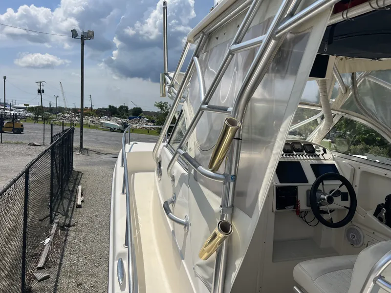 Slide: The Image of 2002 World Cat 266SC boat, side view with helm station. - 15