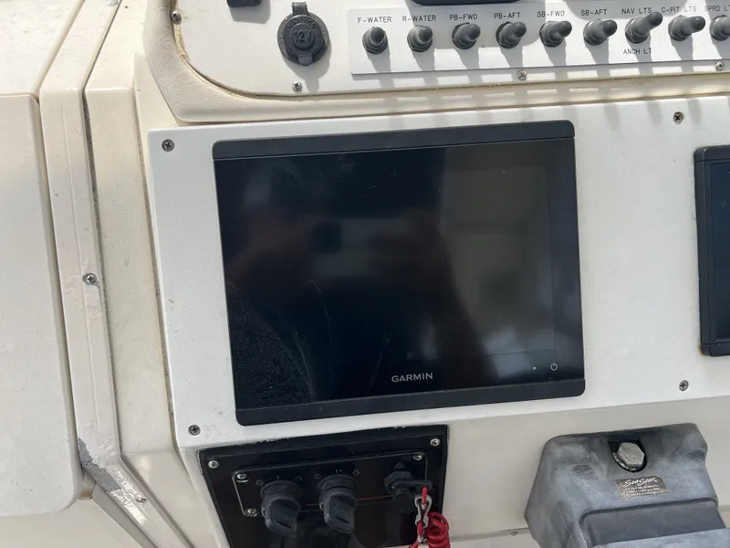 Slide: The Image of Dashboard of a World Cat 266SC boat with Garmin display. - 5