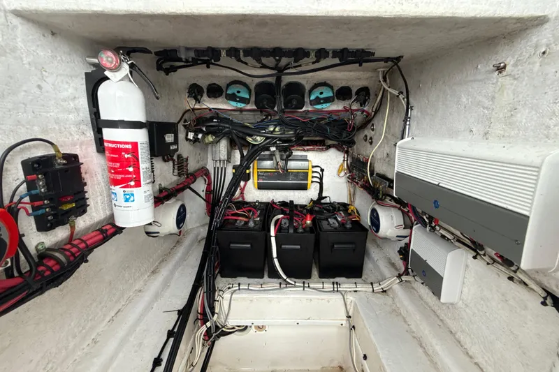 Slide: The Image of Electrical system of a 2005 Contender 27 Open boat, featuring wiring and components. - 19