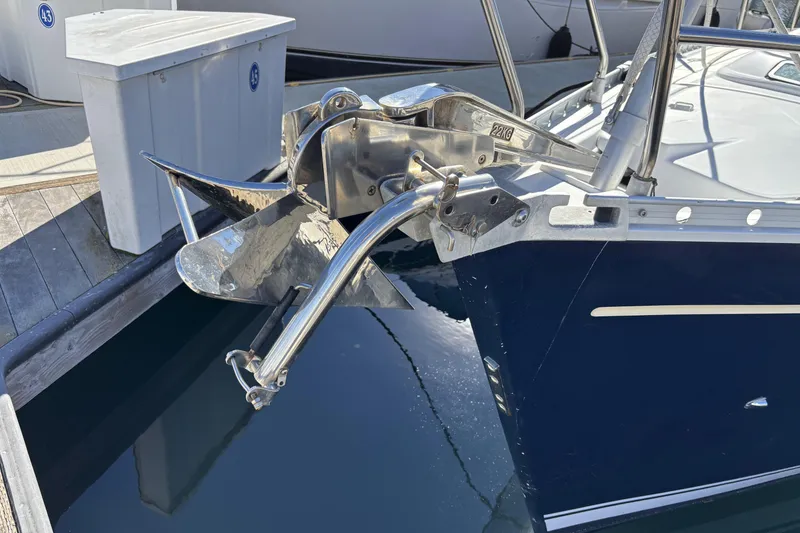 Slide: The Image of Bow of 1997 Beneteau Oceanis 400 with anchor, docked at marina. - 3