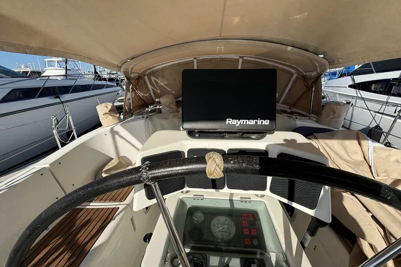 Slide: The Image of Cockpit view of 1997 Beneteau Oceanis 400 sailboat with Raymarine navigation system. - 38