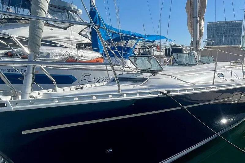 Slide: The Image of 1997 Beneteau Oceanis 400 sailboat docked in marina, side view. - 4