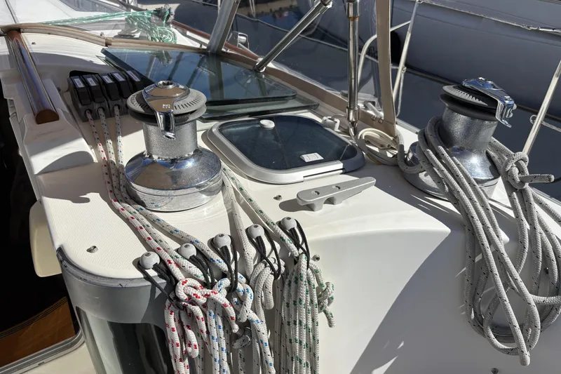 Slide: The Image of Deck of 1997 Beneteau Oceanis 400 sailboat with winches and ropes. - 51