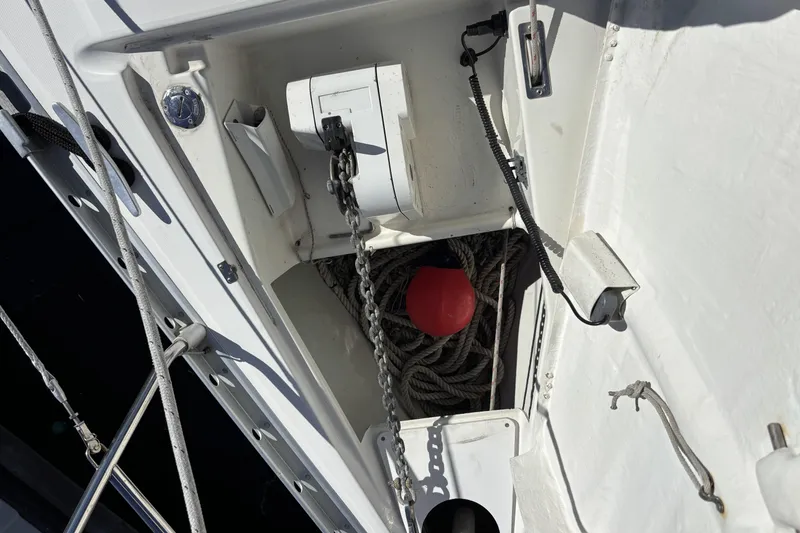 Slide: The Image of Anchor locker of 1997 Beneteau Oceanis 400 with ropes and red buoy. - 6