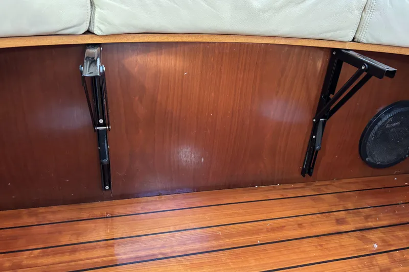 Slide: The Image of Interior of 1997 Beneteau Oceanis 400 yacht with wooden paneling and speaker. - 61