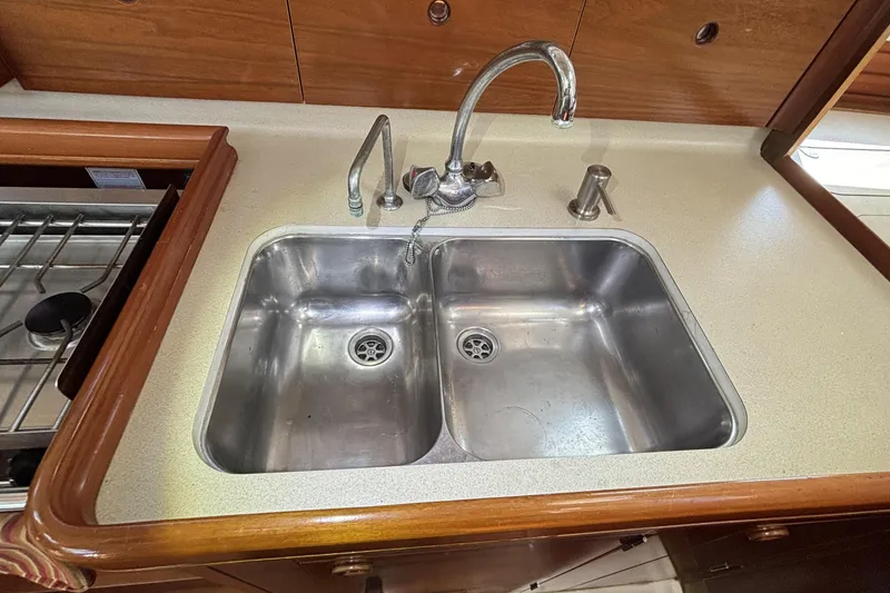Slide: The Image of Stainless steel double sink in 1997 Beneteau Oceanis 400 yacht kitchen. - 70