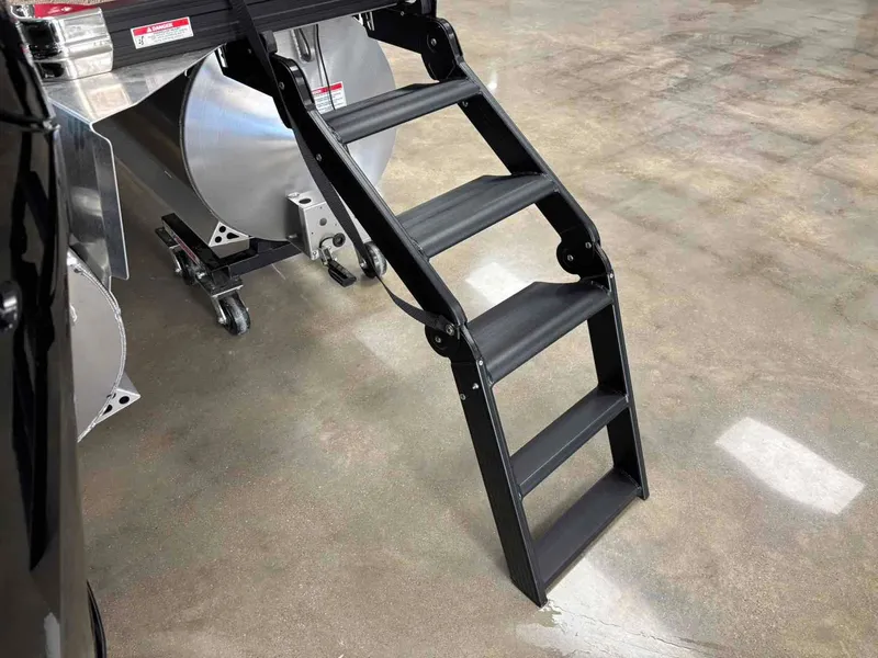 Slide: The Image of Close-up of a shiny propeller on the 2026 Barletta Cabrio 22QC. - 11