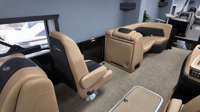 Slide: The Image of Interior of 2026 Barletta Cabrio 22QC with luxurious seating. - 22