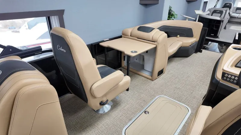 Slide: The Image of Interior of 2026 Barletta Cabrio 22QC with beige leather seating. - 23