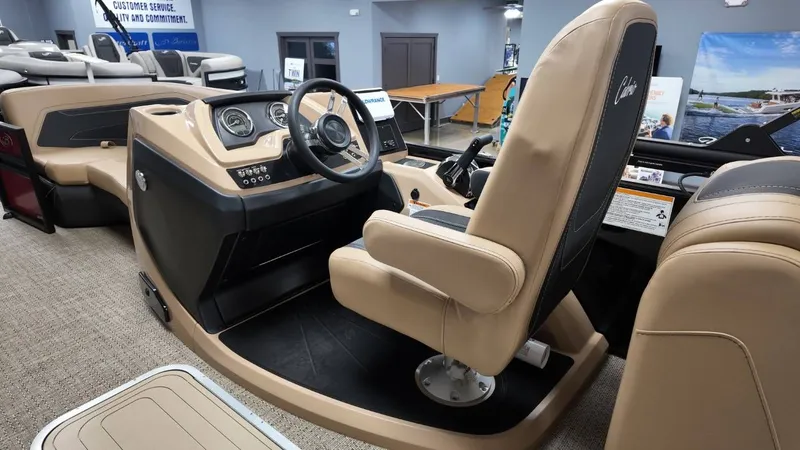 Slide: The Image of Interior of 2026 Barletta Cabrio 22QC with steering wheel and seats. - 32