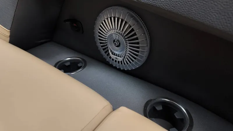 Slide: The Image of 2026 Barletta Cabrio 22QC interior with speaker and cup holders. - 48