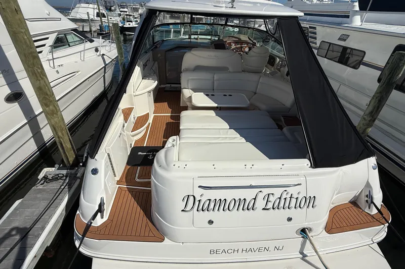 Slide: The Image of View from 2003 Sea Ray 460 Sundancer yacht, docked at a marina under clear blue skies. - 21