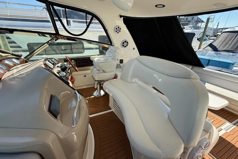 Slide: The Image of Luxurious interior of 2003 Sea Ray 460 Sundancer yacht with kitchenette and cozy bedroom. - 26