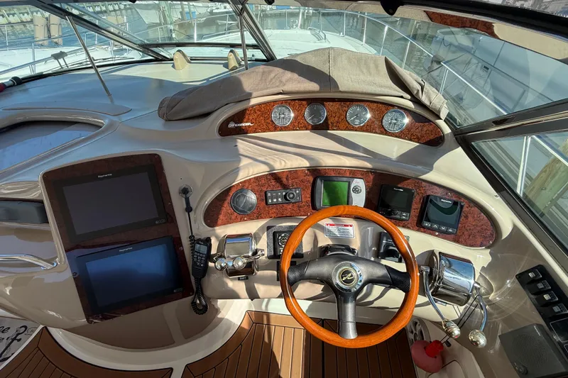 Slide: The Image of Luxurious cabin interior of 2003 Sea Ray 460 Sundancer yacht with nautical-themed bedding. - 30