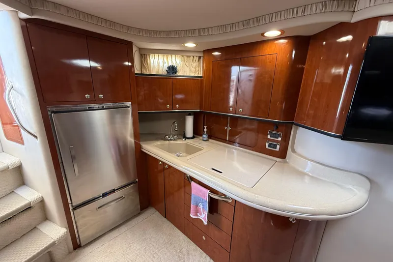 Slide: The Image of Bathroom interior of 2003 Sea Ray 460 Sundancer yacht with shower and porthole window. - 33